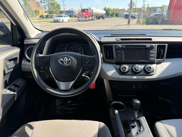 used 2013 Toyota RAV4 car, priced at $13,000