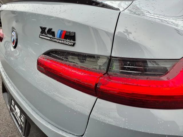 used 2023 BMW X4 M car, priced at $66,695