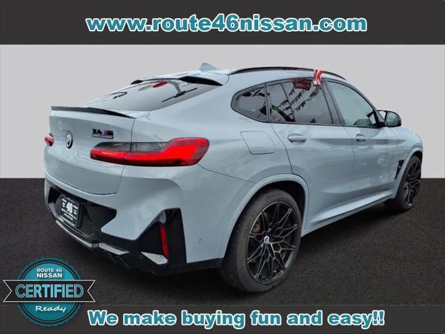 used 2023 BMW X4 M car, priced at $66,695