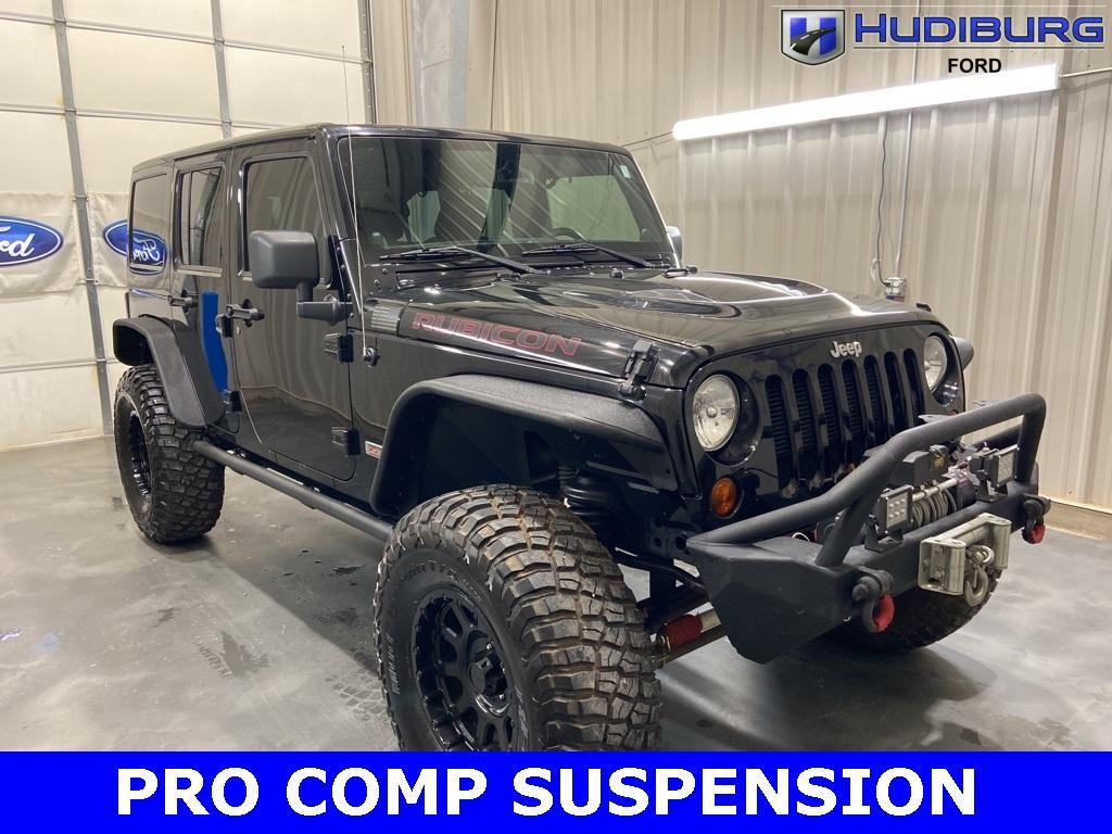 used 2013 Jeep Wrangler Unlimited car, priced at $25,990