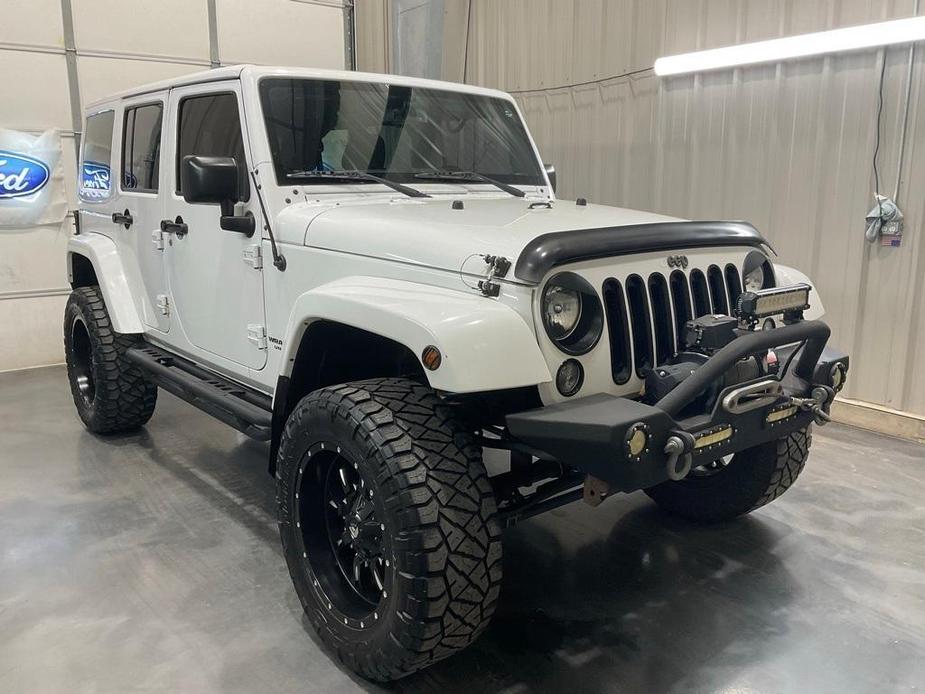 used 2015 Jeep Wrangler Unlimited car, priced at $23,240