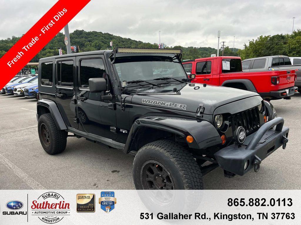 used 2010 Jeep Wrangler Unlimited car, priced at $14,700