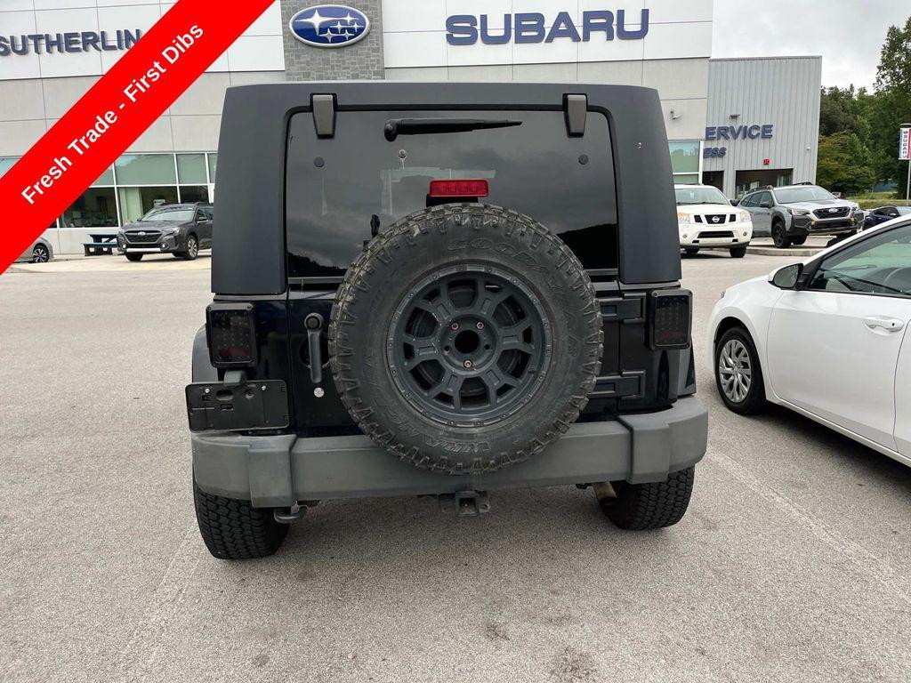 used 2010 Jeep Wrangler Unlimited car, priced at $14,700