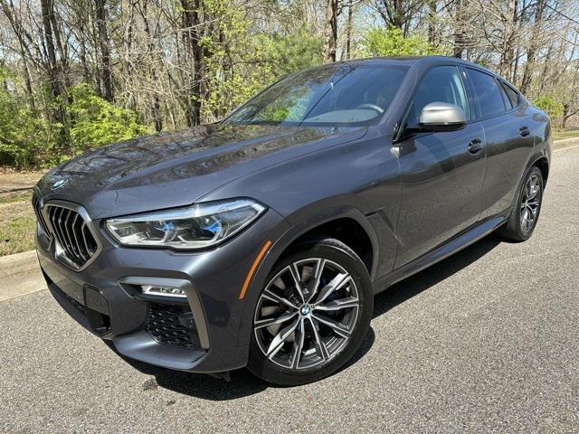 used 2021 BMW X6 car, priced at $54,988