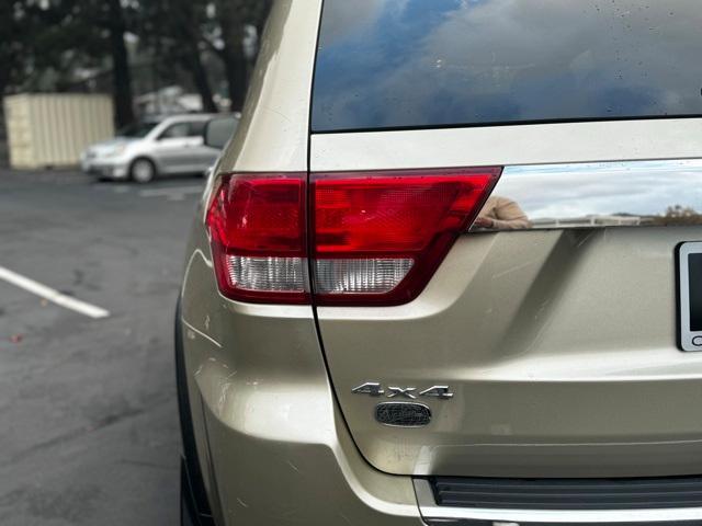 used 2011 Jeep Grand Cherokee car, priced at $9,799