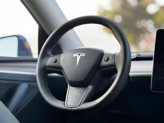 used 2024 Tesla Model Y car, priced at $34,999