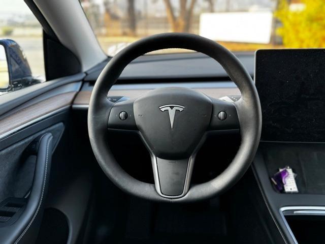 used 2024 Tesla Model Y car, priced at $34,999