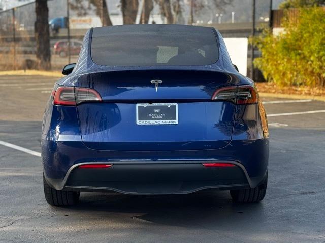 used 2024 Tesla Model Y car, priced at $34,999