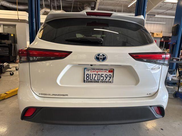 used 2021 Toyota Highlander Hybrid car, priced at $27,499