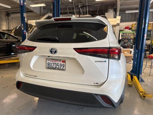 used 2021 Toyota Highlander Hybrid car, priced at $27,499