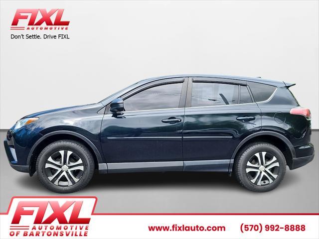 used 2018 Toyota RAV4 car, priced at $18,263