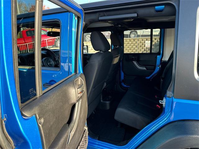 used 2015 Jeep Wrangler Unlimited car, priced at $16,980