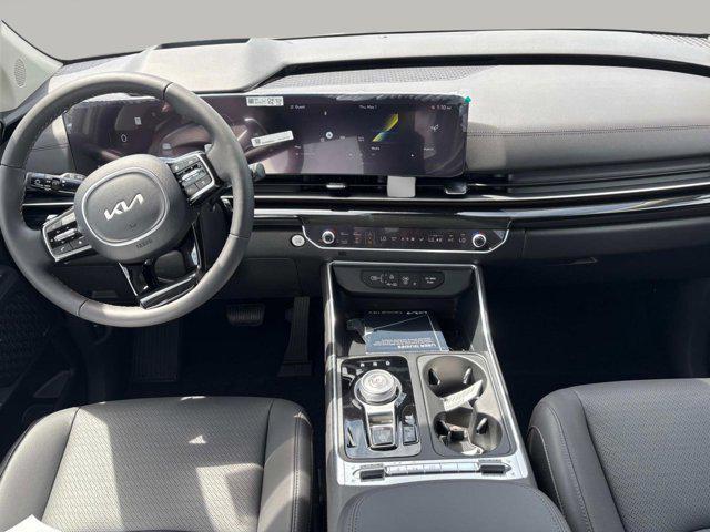 new 2025 Kia Carnival Hybrid car, priced at $56,175