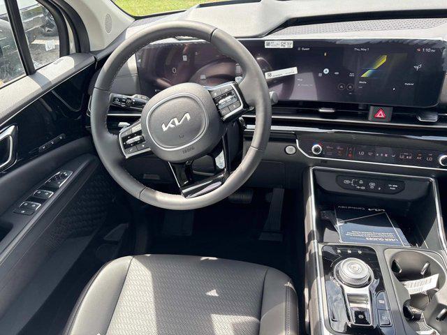 new 2025 Kia Carnival Hybrid car, priced at $56,175