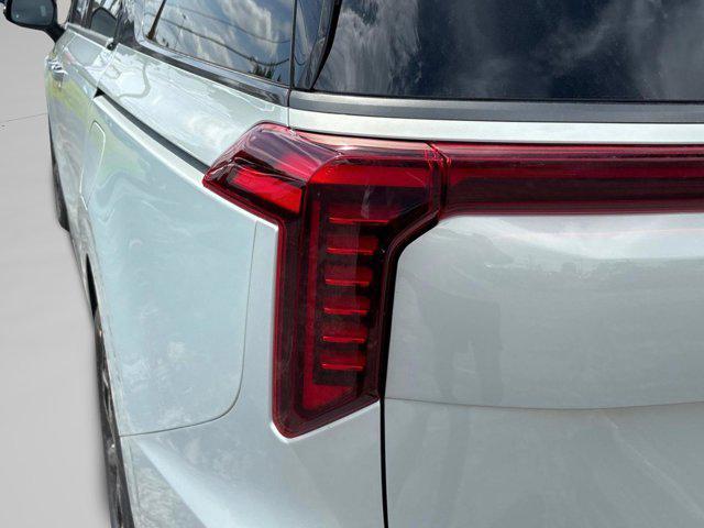 new 2025 Kia Carnival Hybrid car, priced at $56,175