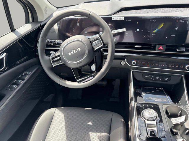 new 2025 Kia Carnival Hybrid car, priced at $56,175
