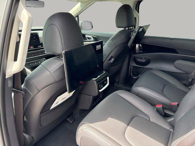 new 2025 Kia Carnival Hybrid car, priced at $56,175