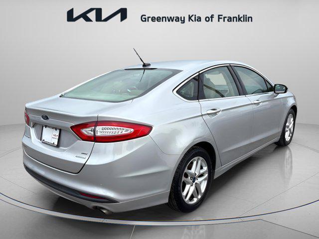 used 2016 Ford Fusion car, priced at $12,000