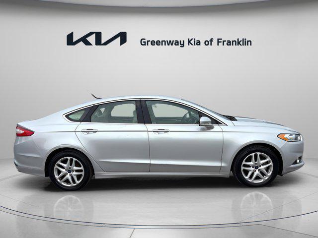 used 2016 Ford Fusion car, priced at $12,000