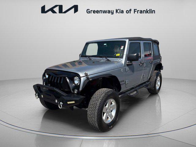 used 2014 Jeep Wrangler Unlimited car, priced at $16,400