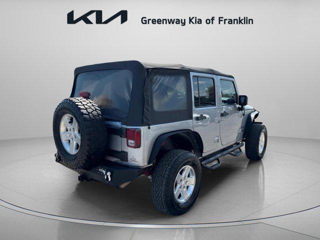 used 2014 Jeep Wrangler Unlimited car, priced at $16,400