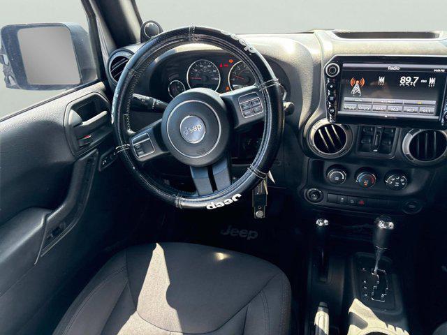 used 2014 Jeep Wrangler Unlimited car, priced at $16,400
