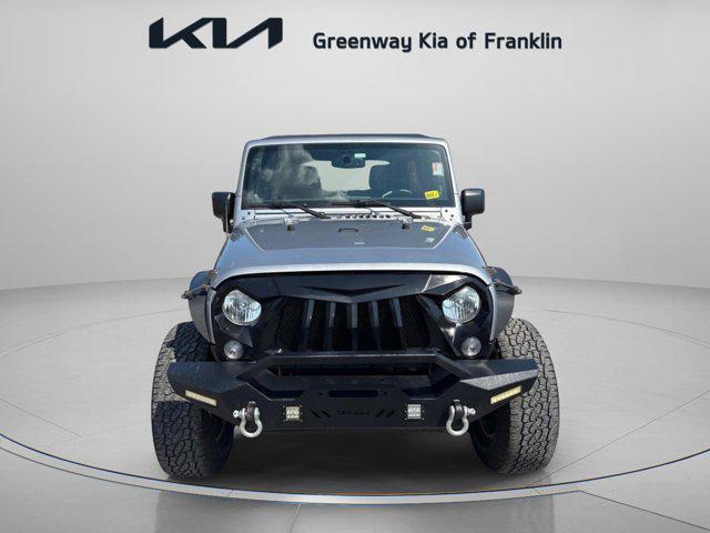 used 2014 Jeep Wrangler Unlimited car, priced at $16,400