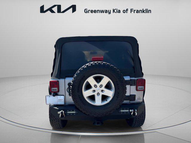 used 2014 Jeep Wrangler Unlimited car, priced at $16,400