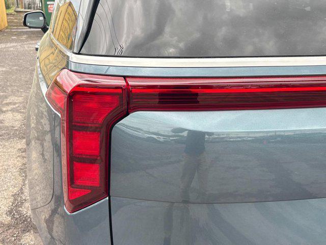 new 2025 Kia Carnival Hybrid car, priced at $50,215