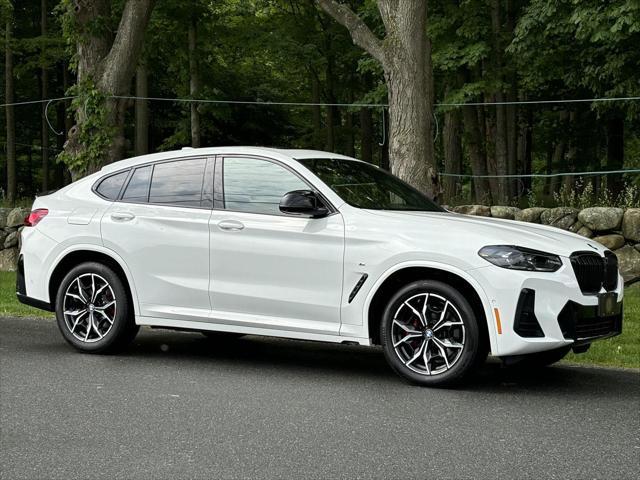 used 2023 BMW X4 car, priced at $55,887
