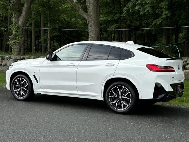used 2023 BMW X4 car, priced at $55,887