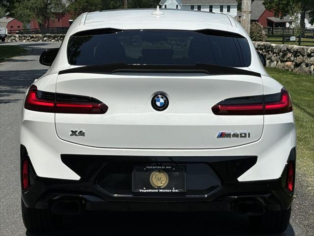 used 2023 BMW X4 car, priced at $55,887