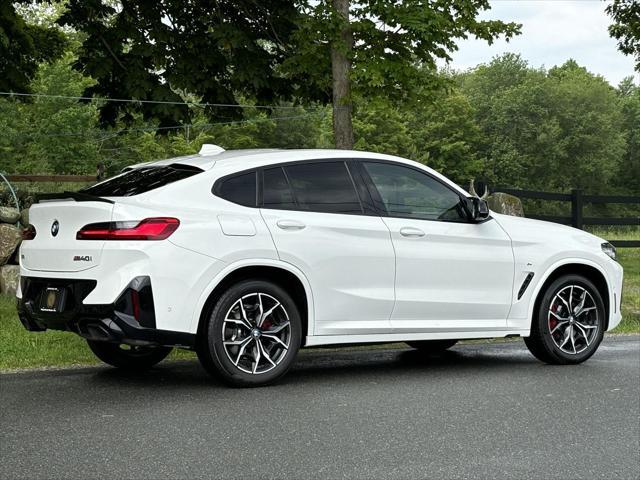 used 2023 BMW X4 car, priced at $55,887