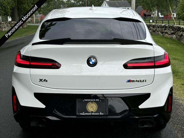 used 2023 BMW X4 car, priced at $55,887
