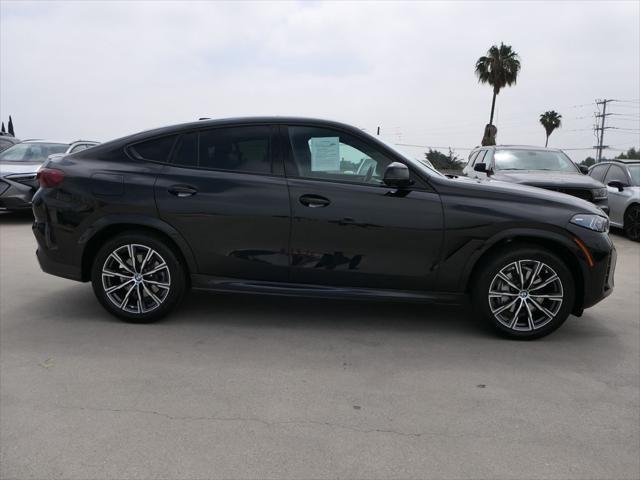 used 2025 BMW X6 car, priced at $73,500