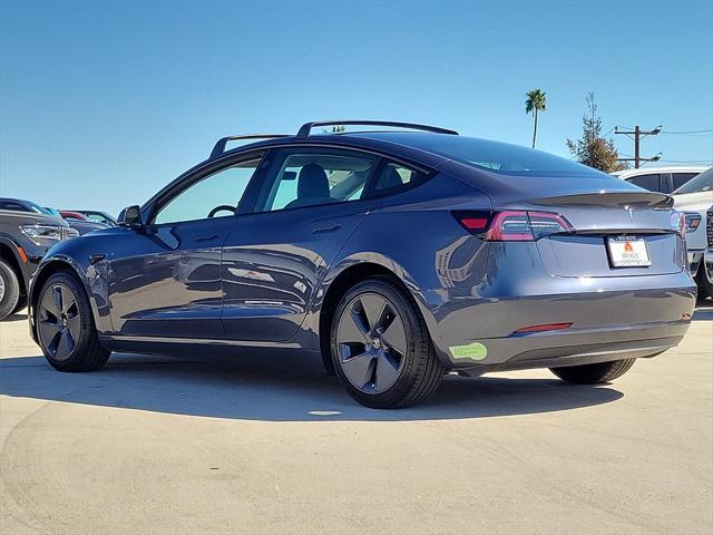 used 2023 Tesla Model 3 car, priced at $28,000