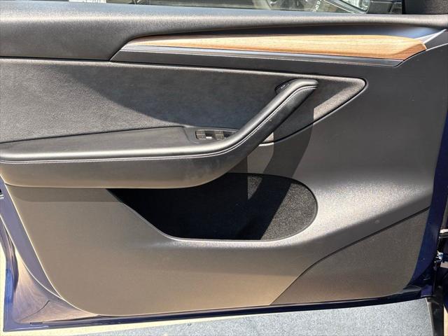 used 2023 Tesla Model Y car, priced at $32,000