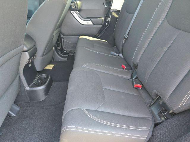 used 2016 Jeep Wrangler Unlimited car, priced at $17,687