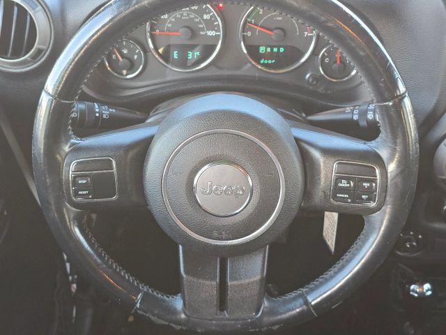 used 2015 Jeep Wrangler Unlimited car, priced at $13,287