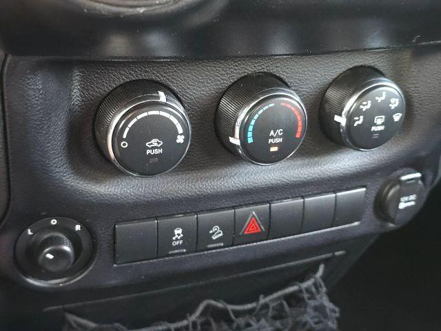 used 2015 Jeep Wrangler Unlimited car, priced at $13,287