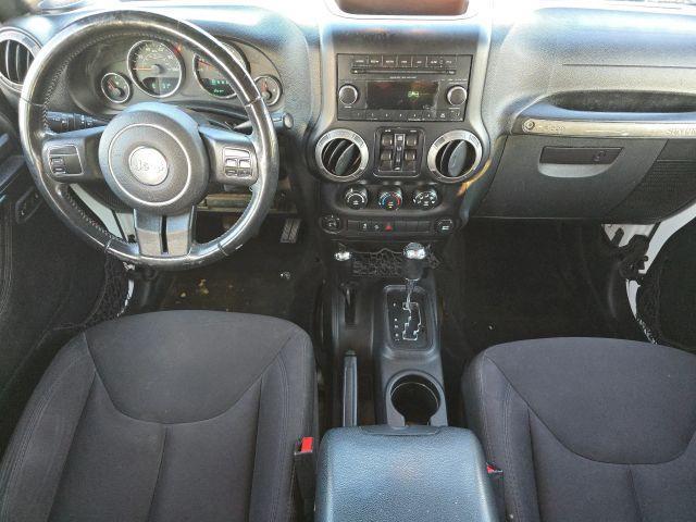 used 2015 Jeep Wrangler Unlimited car, priced at $13,287