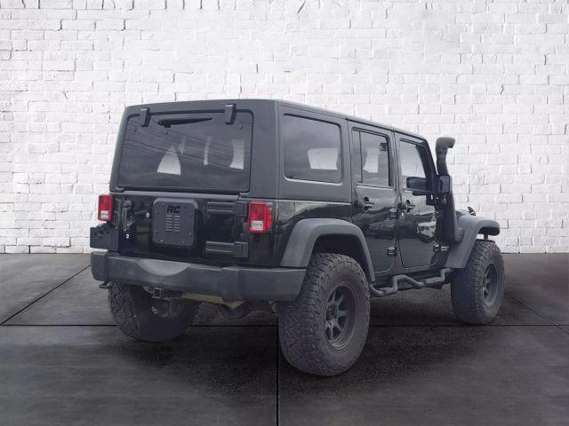 used 2015 Jeep Wrangler Unlimited car, priced at $20,287
