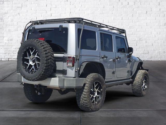 used 2014 Jeep Wrangler Unlimited car, priced at $17,987