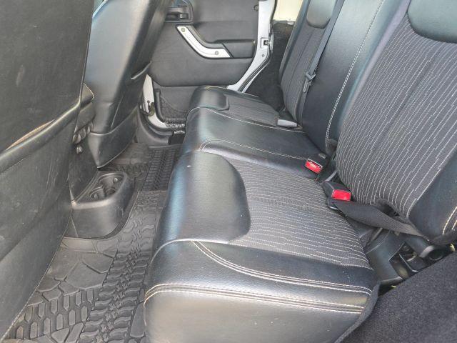 used 2014 Jeep Wrangler Unlimited car, priced at $13,987