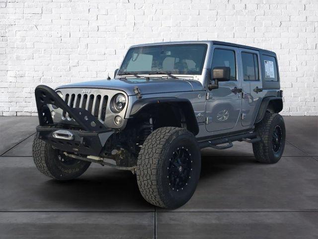 used 2014 Jeep Wrangler Unlimited car, priced at $13,987