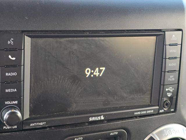 used 2014 Jeep Wrangler Unlimited car, priced at $13,987