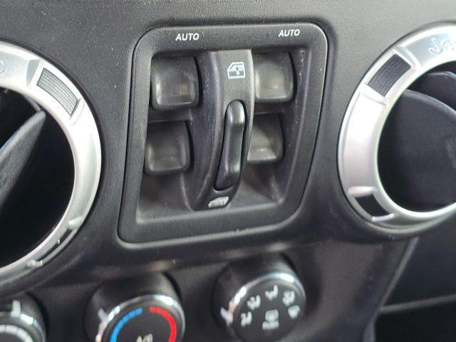 used 2014 Jeep Wrangler Unlimited car, priced at $13,987