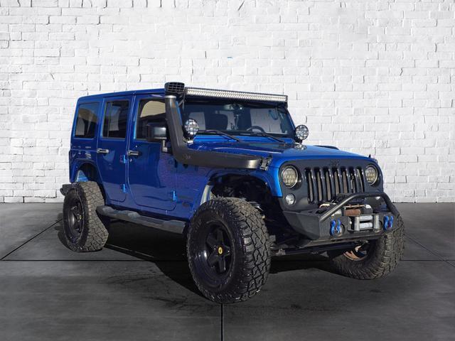 used 2014 Jeep Wrangler Unlimited car, priced at $19,788