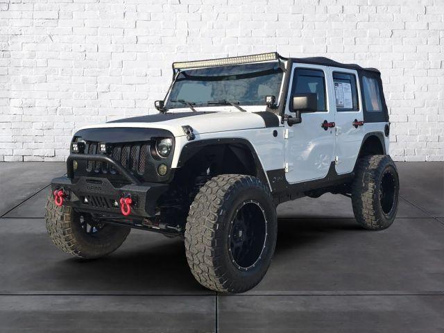 used 2011 Jeep Wrangler Unlimited car, priced at $12,987