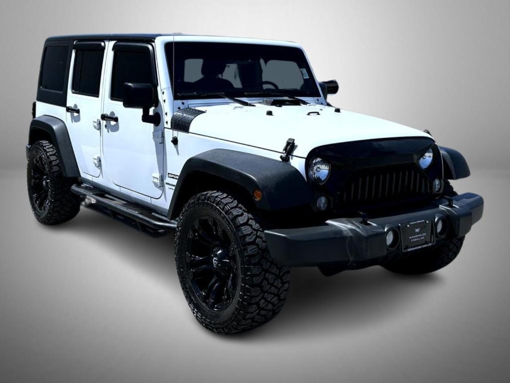 used 2018 Jeep Wrangler JK Unlimited car, priced at $23,532